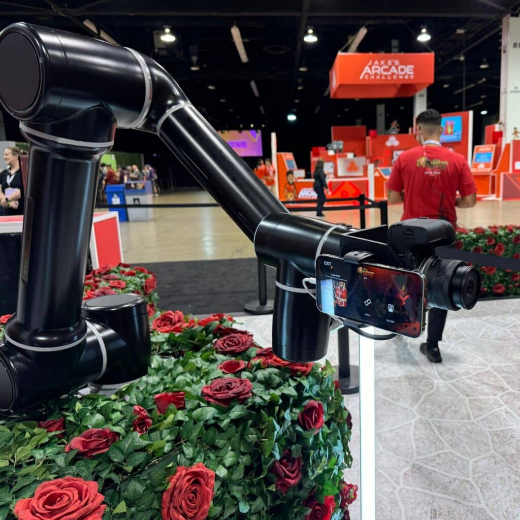 Glambot Holding a Phone