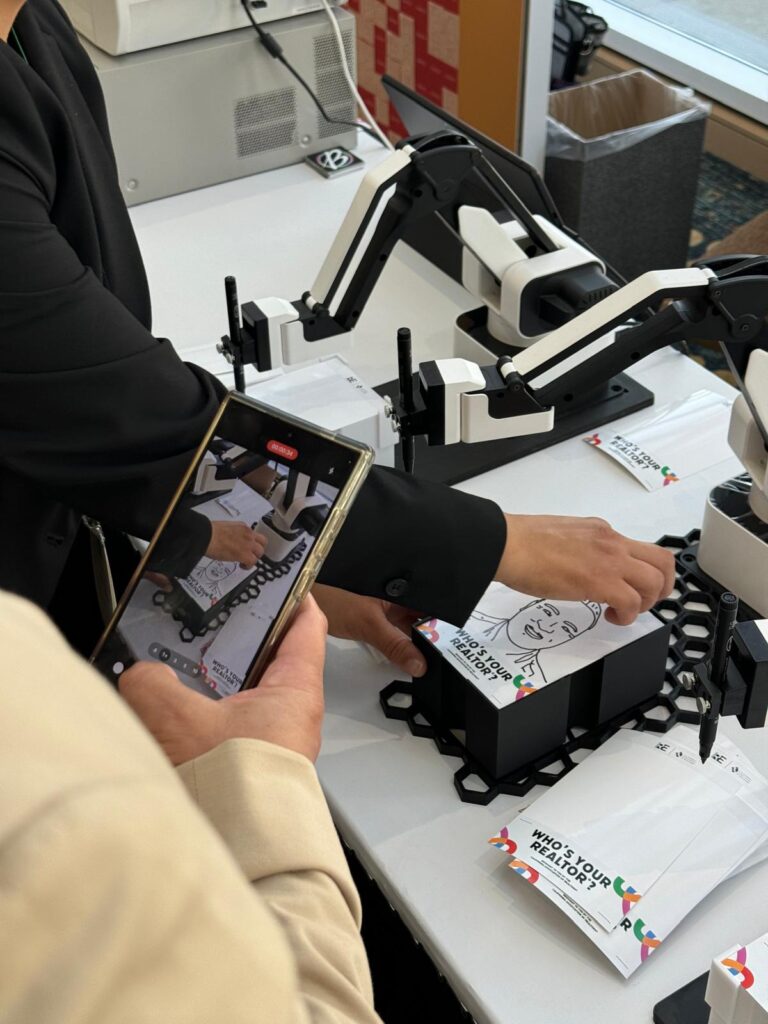 Sketchbot robotic arm drawing a person