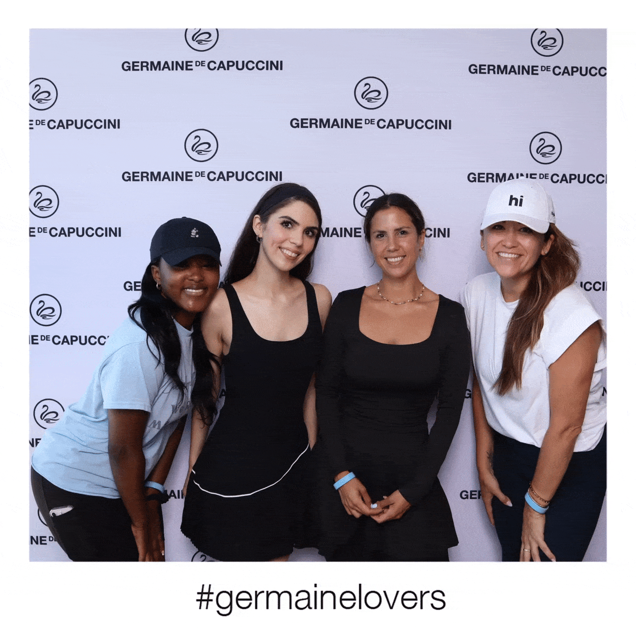 Group of ladies posing in front the Germaine de capuccini photo booth
