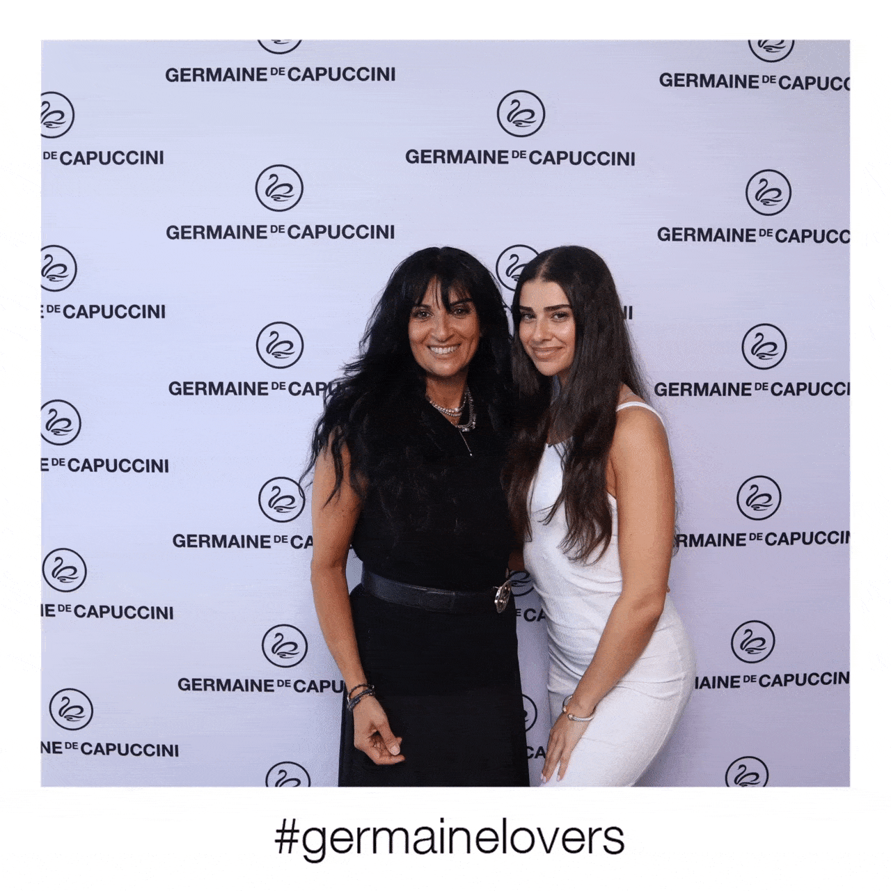 A mom and daughter posing for the Germaine de Capuccini photos