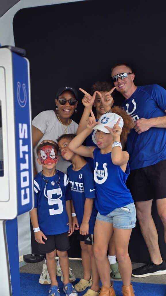 Group of people taking a photo for the colts mosaic