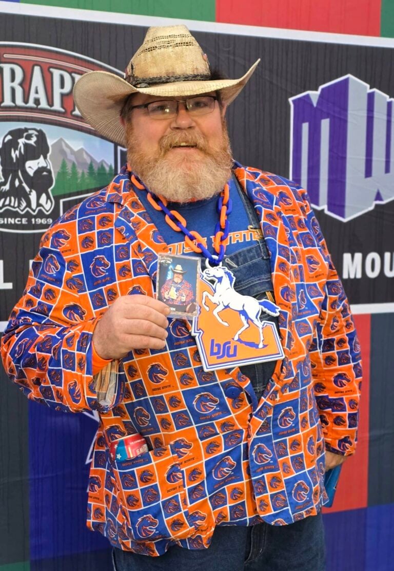 Well-dresssed guy with his own trading card at Boise State Vs. UNLV game