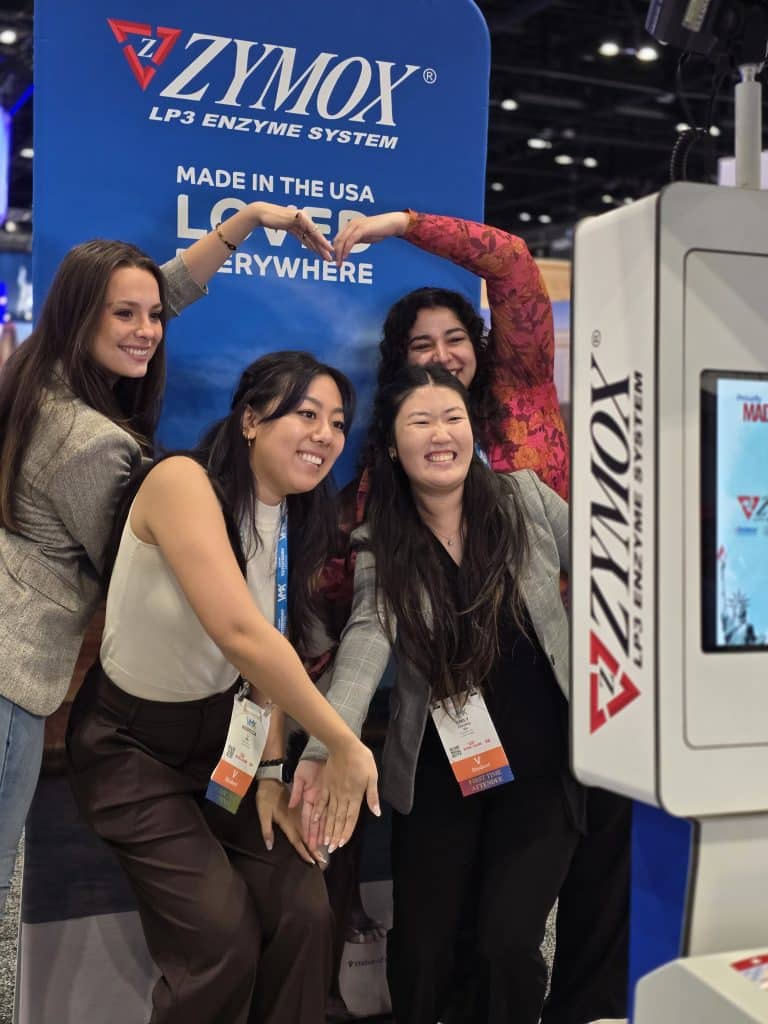 Group of 4 ladies posin in front of the camera at VMX 2026