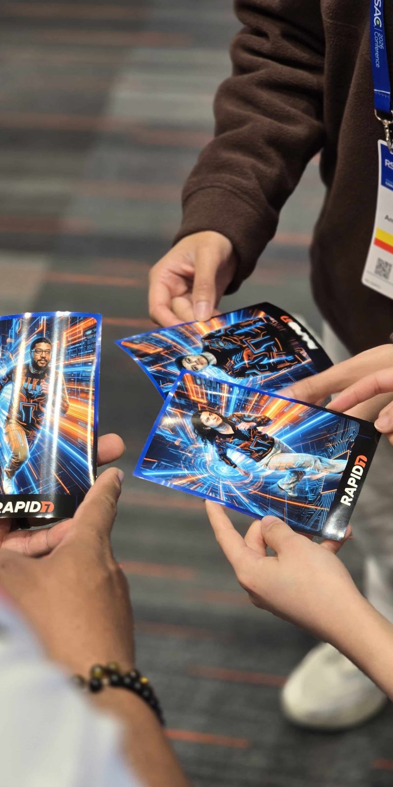RSAC 2026 03 Three people holding their photo prints at the RSAC 2026