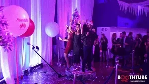 People celebrating in a party on the 360 photo booth working with a just-launched hawei cellhpone