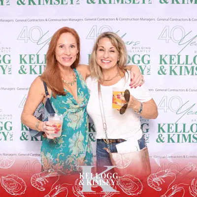 Two ladies taking a picture at the GIF Booth