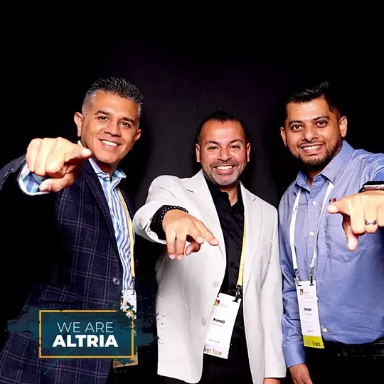 Group of 4 people posing for the Altria Group GIF Booth