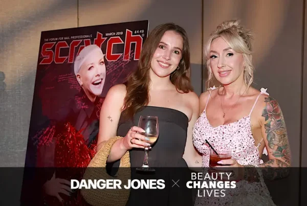 Two ladies posing in front of the camera at the Beauty changes lives Gala 2026