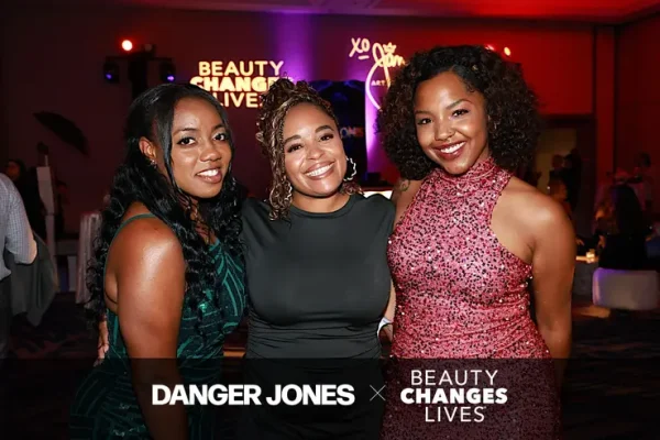 A group of three ladies getting their picture taken by the roamer photographer at Beauty changes lives Gala 2026