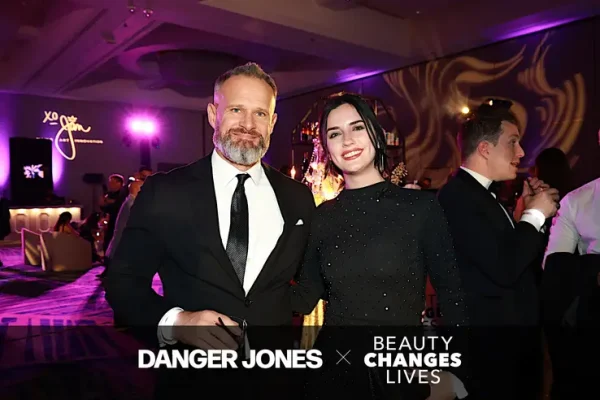 A beutiful couple getting their photo taken at Beauty changes lives Gala 2026
