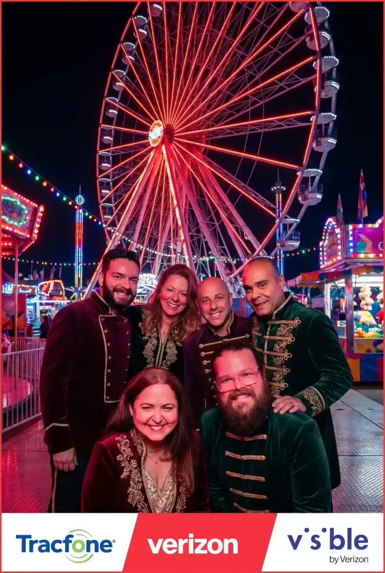 Group of 6 people in front of a ferris wheel in their Best Buy Achievers 2026 AI Photo